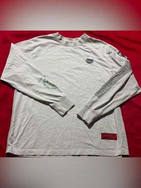 CHNGE Cream Long Sleeve Tee with Green Sleeve Print and Red Hem Patch